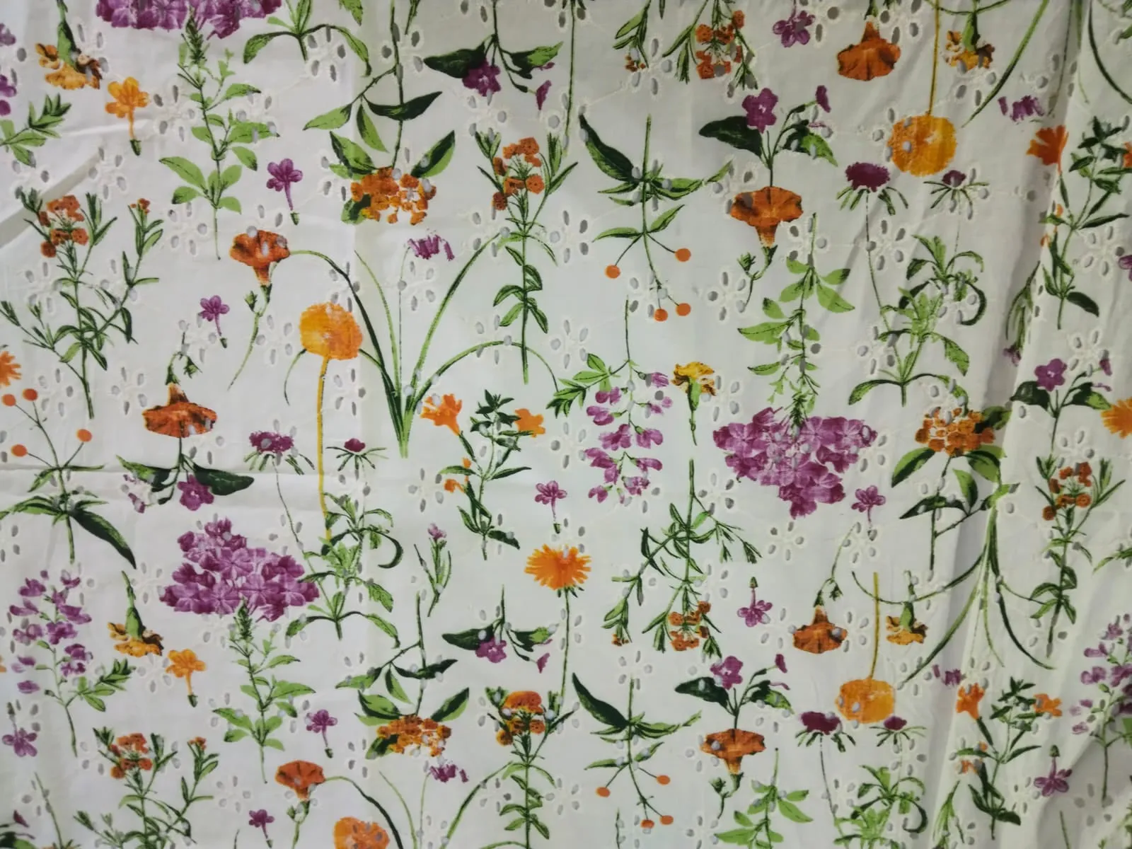 100% Cotton printed and chikan embroidery  fabric  58 inches wide 147 cms. available in 2 colors purple floral/red floral