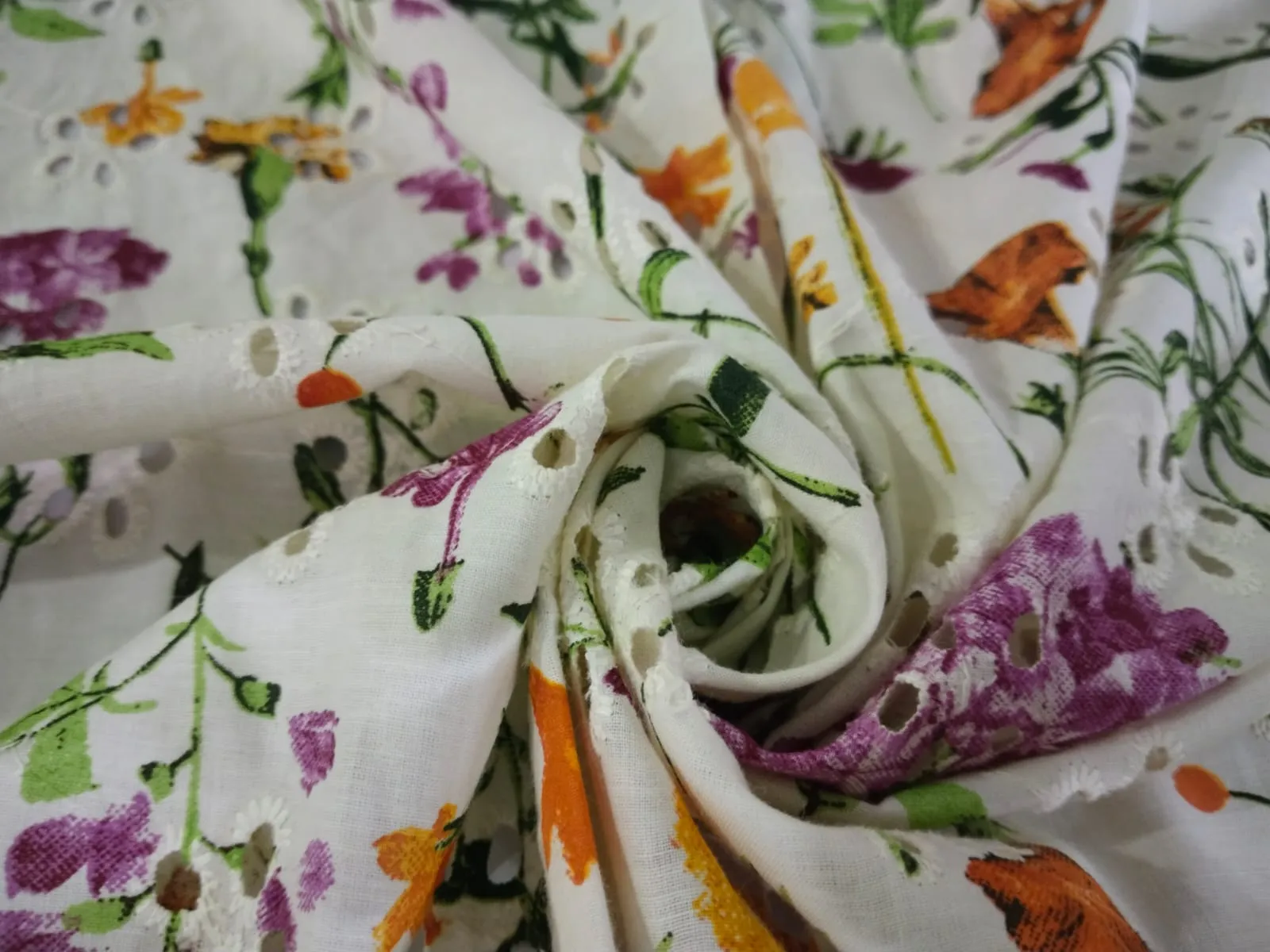 100% Cotton printed and chikan embroidery  fabric  58 inches wide 147 cms. available in 2 colors purple floral/red floral