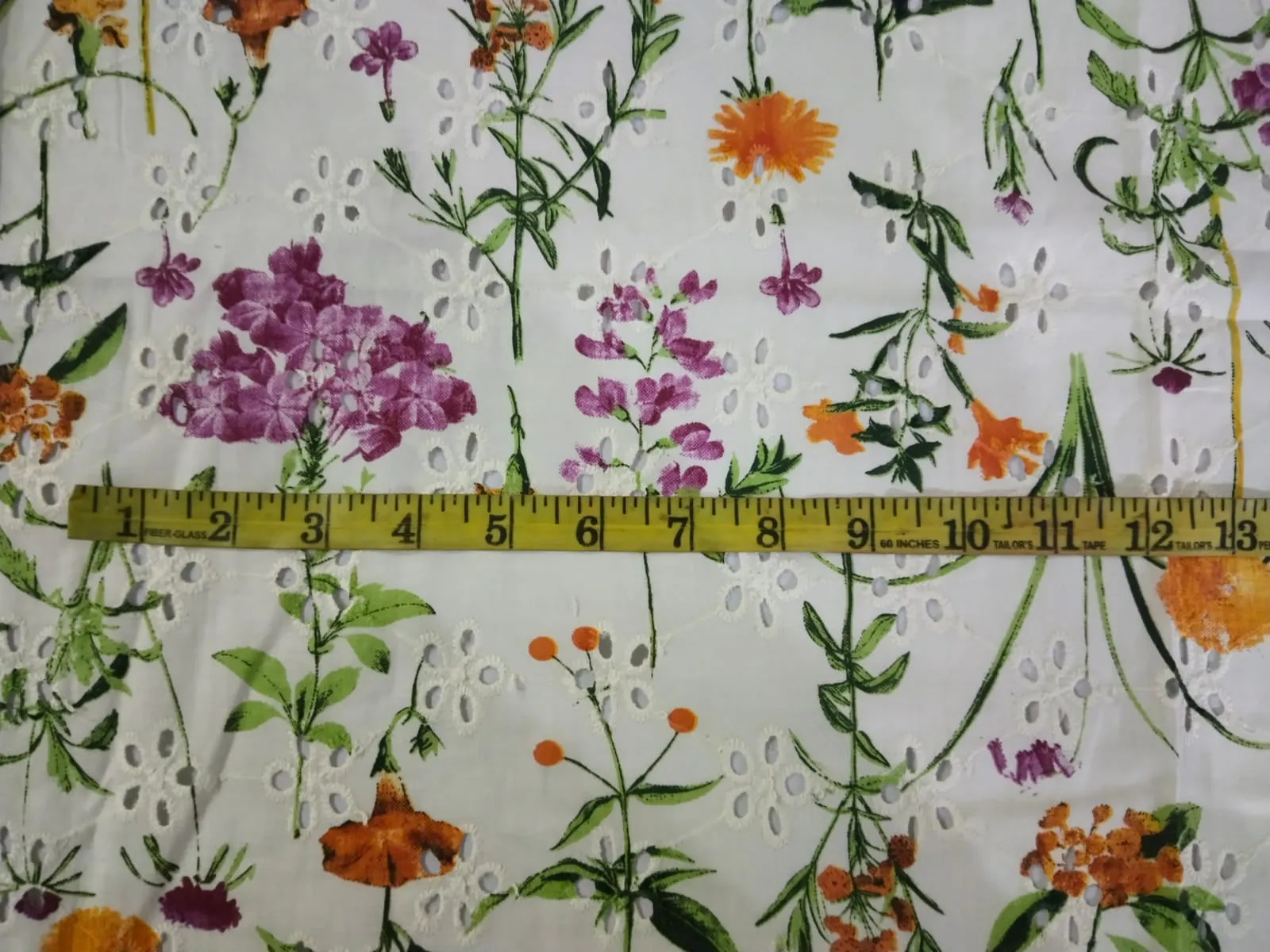 100% Cotton printed and chikan embroidery  fabric  58 inches wide 147 cms. available in 2 colors purple floral/red floral