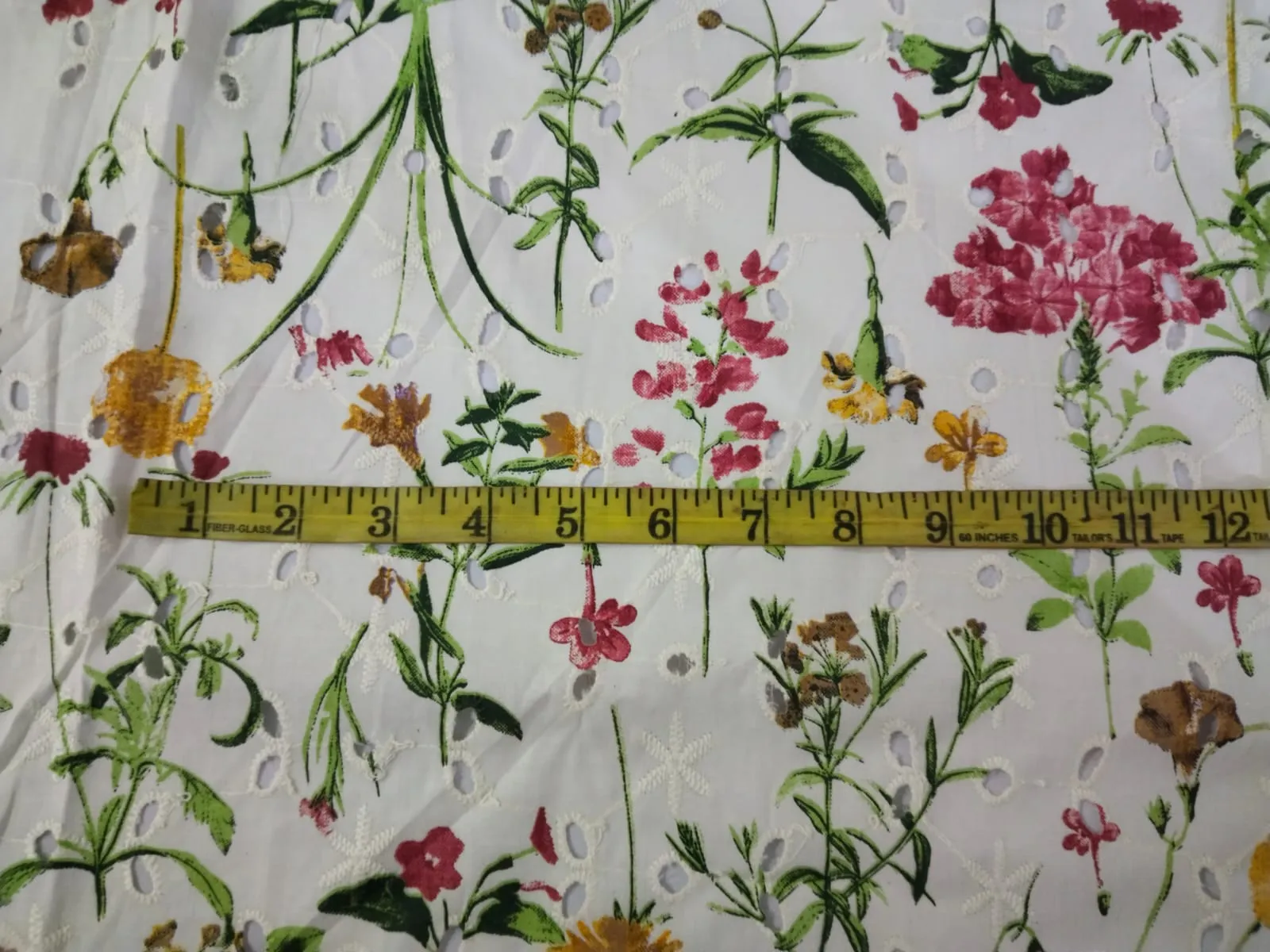 100% Cotton printed and chikan embroidery  fabric  58 inches wide 147 cms. available in 2 colors purple floral/red floral