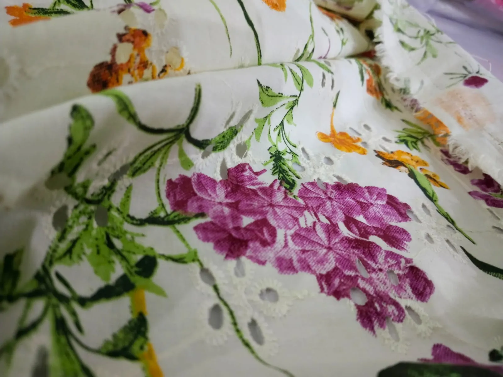 100% Cotton printed and chikan embroidery  fabric  58 inches wide 147 cms. available in 2 colors purple floral/red floral