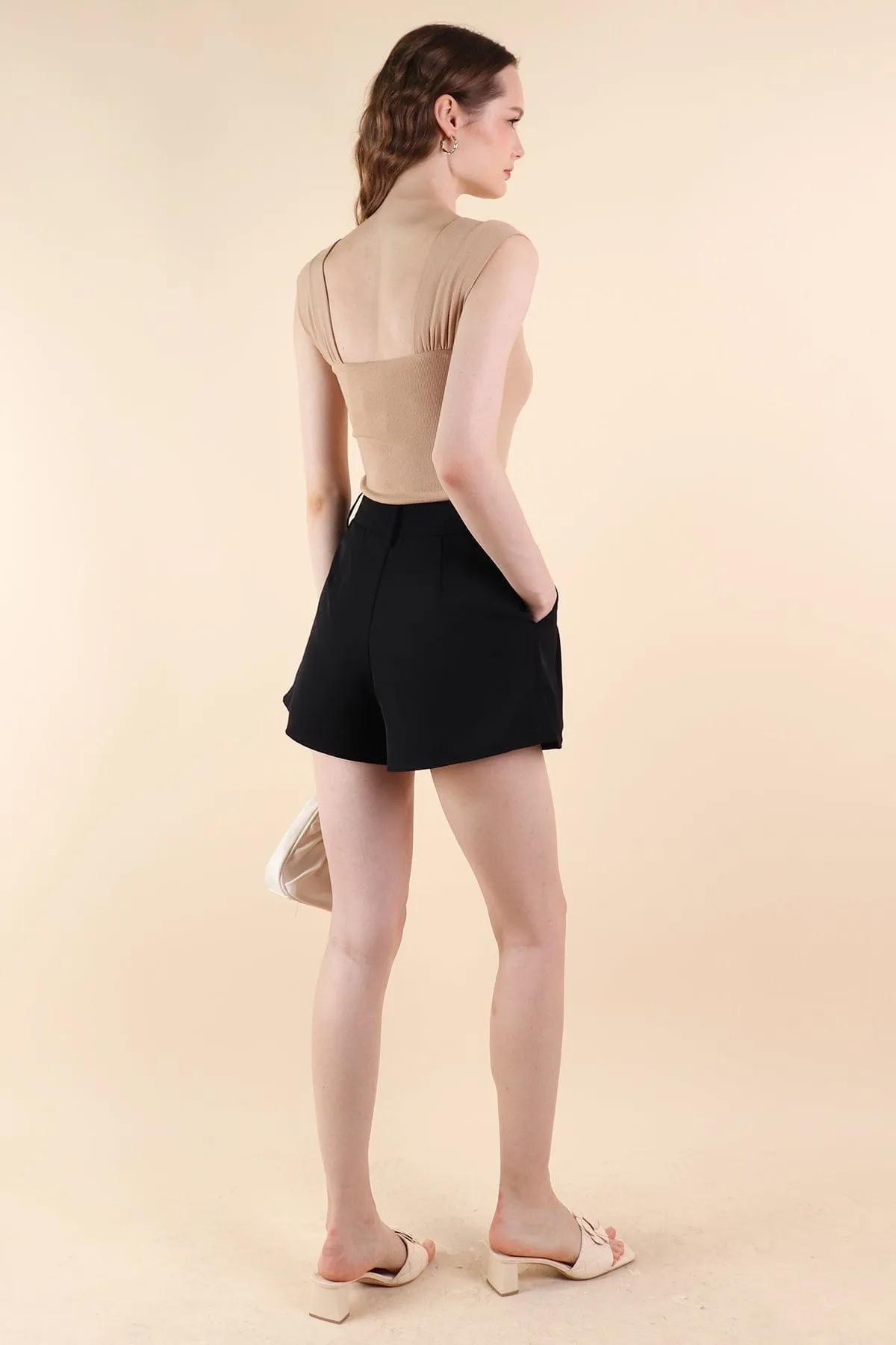 LUCCA BUTTONED PLEATED SHORTS IN BLACK