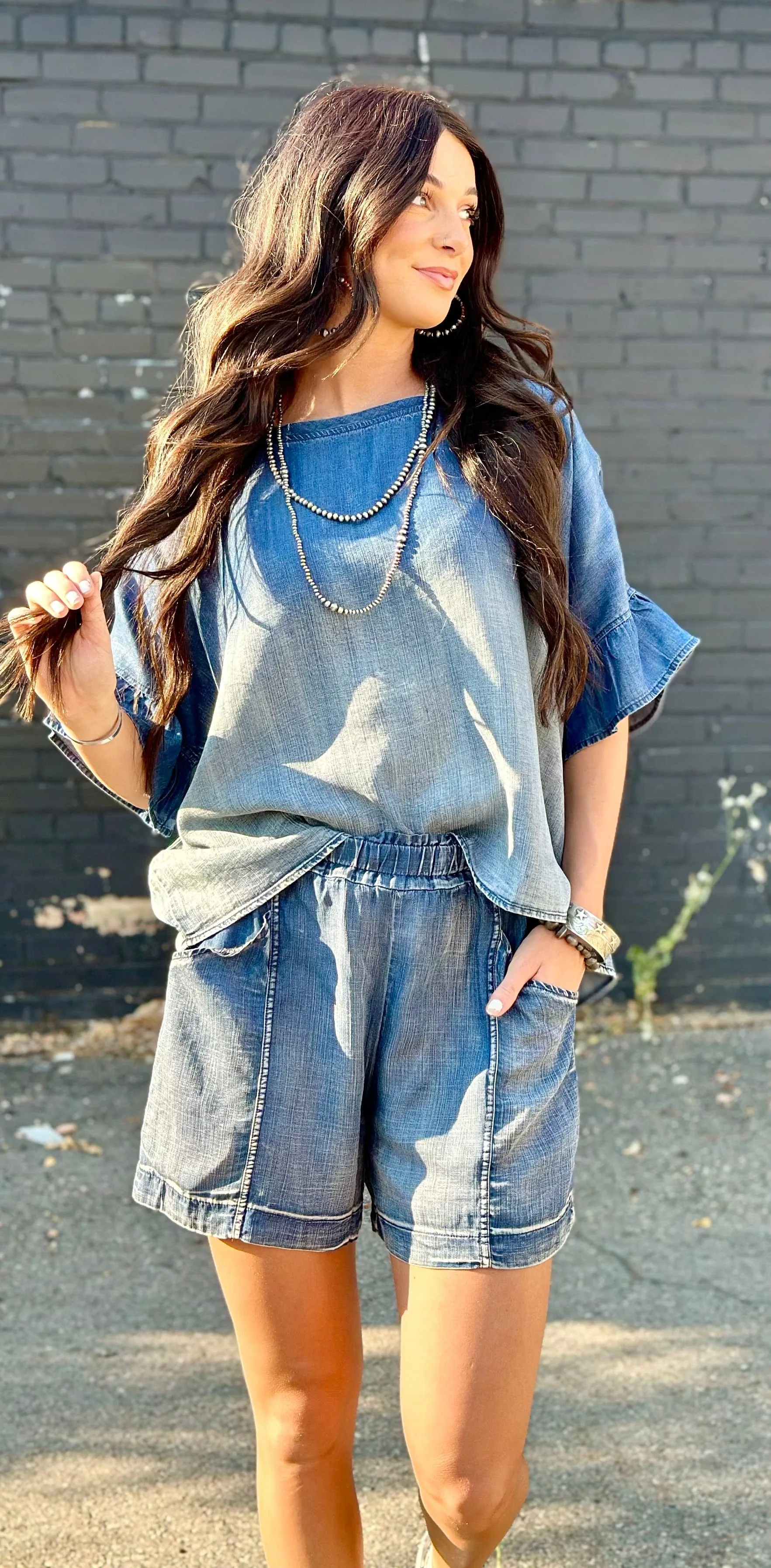 The Rodeo Ruffle Chambray Denim Top